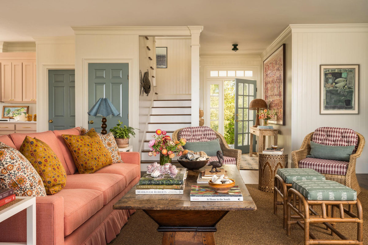 Cozy and warm living room with pink sofa.