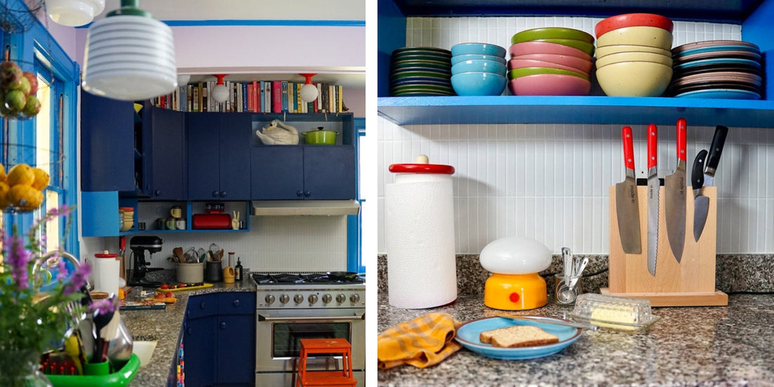 Split view of a kitchen: left with navy cabinets and range; right with granite counter, colorful bowls, knife block