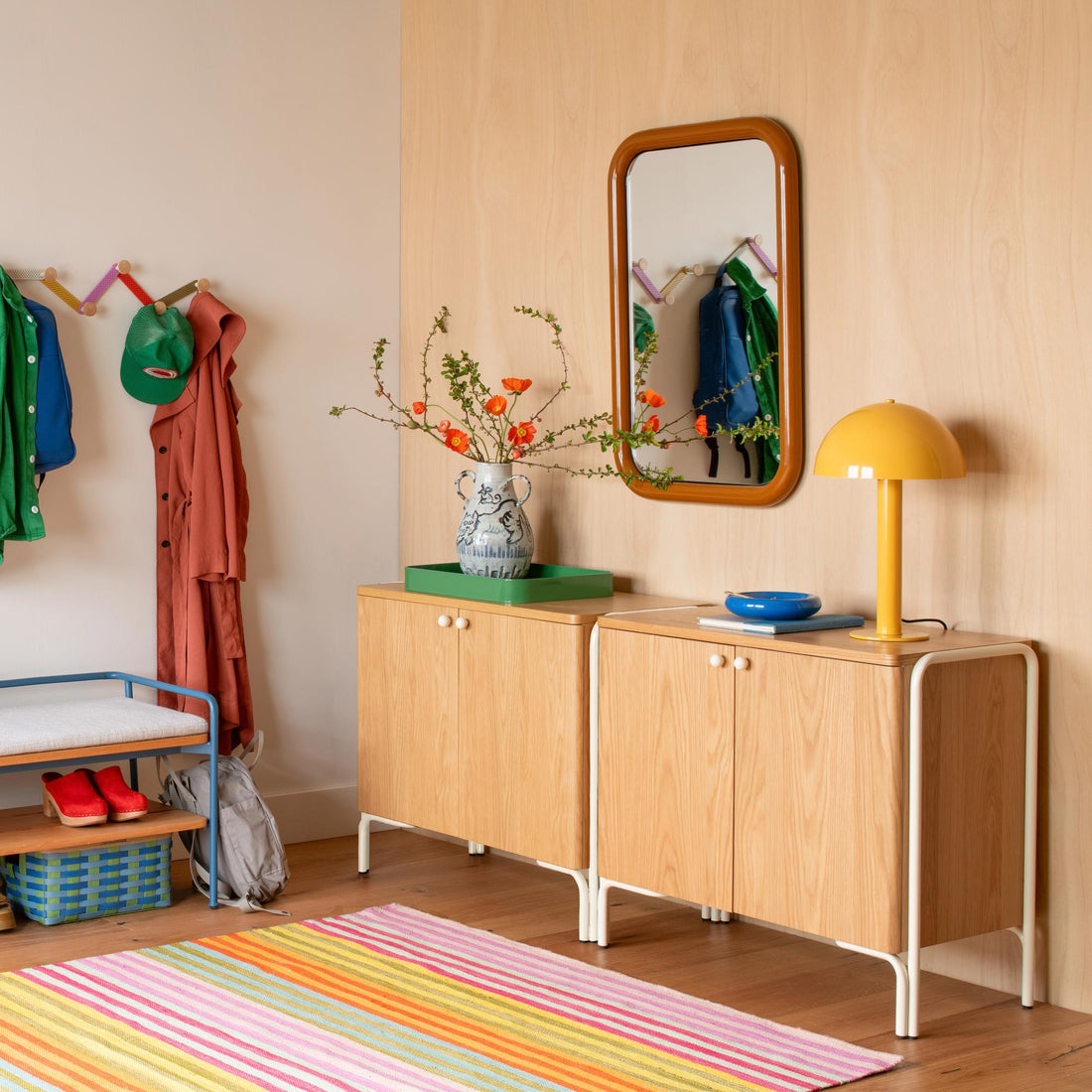 An eclectic, colorful entryway.