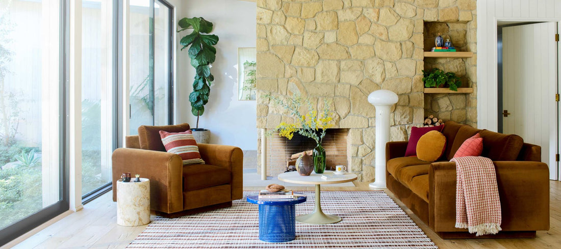 Modern living room with colorful rug and throw pillows