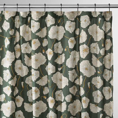 Front view of Blooming Field shower curtain with white poppy pattern and gold stems on green, on silver rod