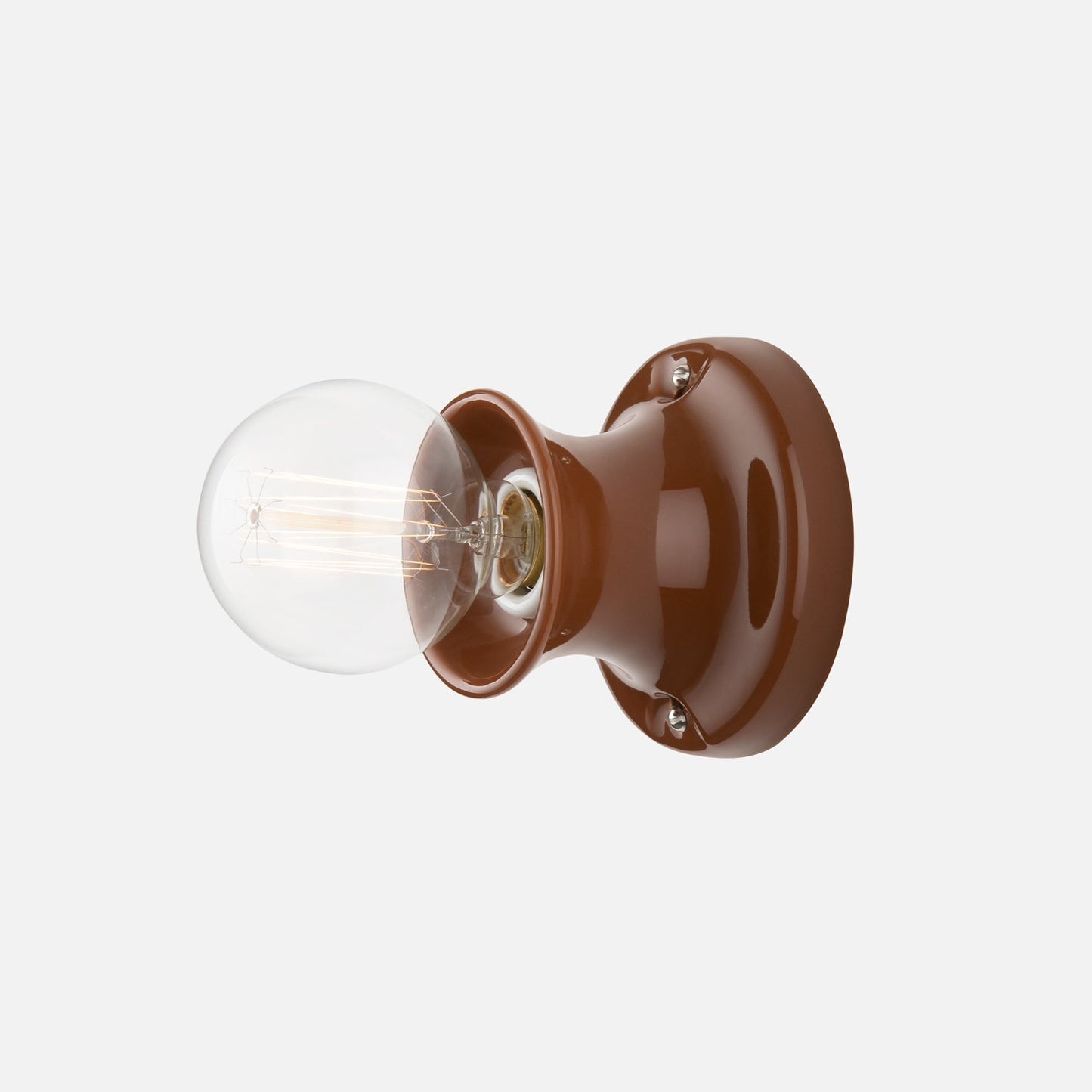 Side view of Alabax Small Flush Mount showcasing tulip-like silhouette, glazed finish, and exposed bulb on white background