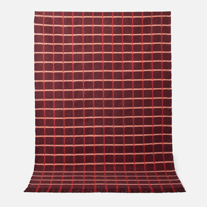 Full-length of Cotton Grid Flatweave Rug showing large contrasting grid pattern, flatwoven 100% cotton with fringed ends on white background