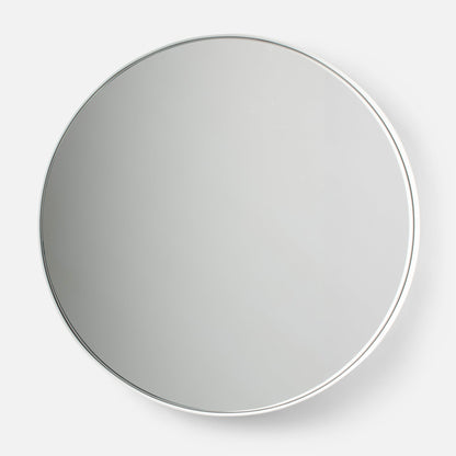 Close-up of top of Leo Mirror 20 by 30 inch in white showcasing thin polished metal frame and round glass with white studio background
