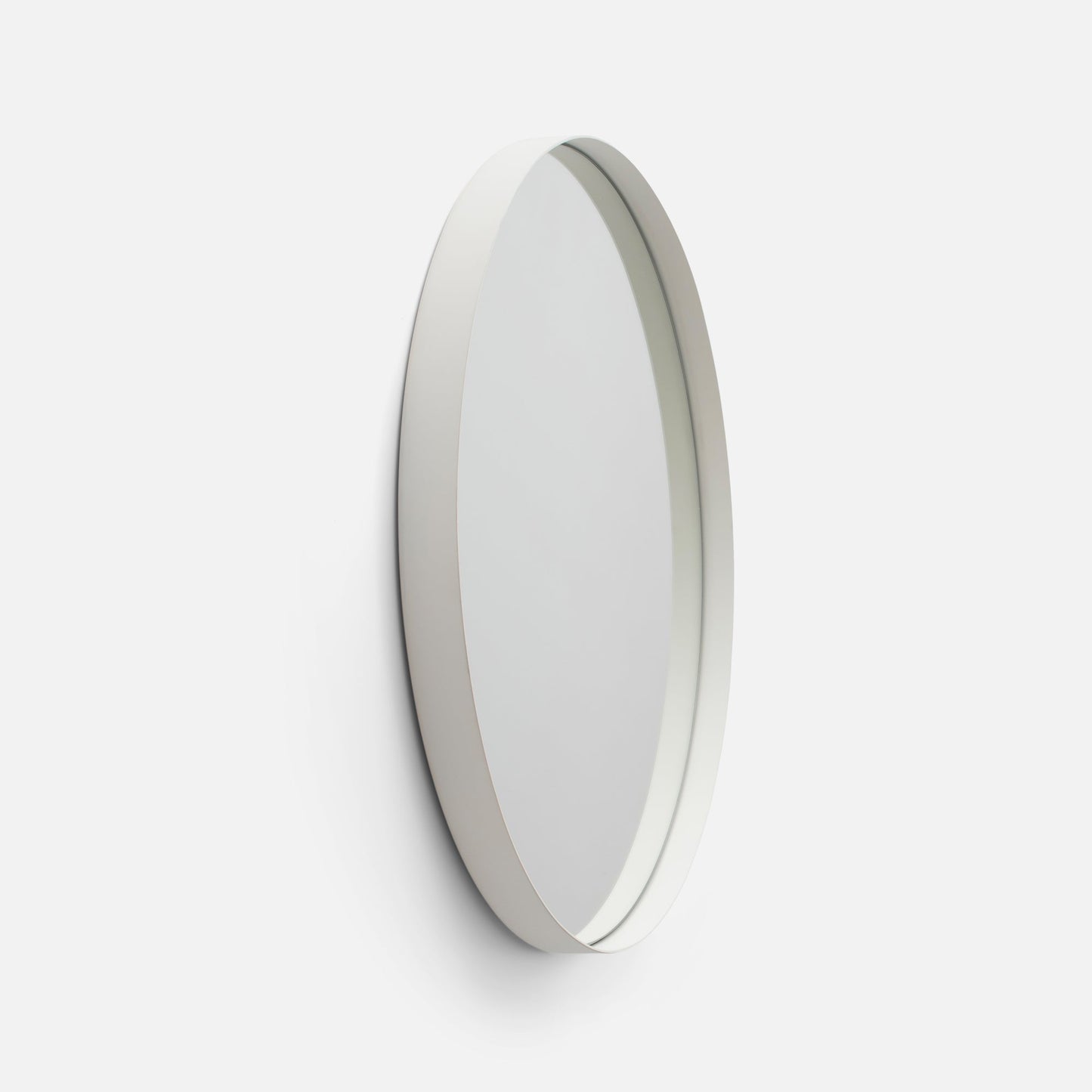 Angled side view of Leo Mirror showcasing white steel frame and slim recessed profile on a white background