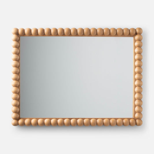 Front view of Bobbin Mirror showcasing a rounded bead-style light wood frame on a neutral gray background
