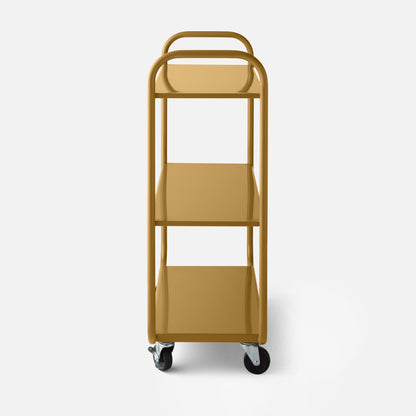 Front view of Miller Storage Cart showing three shelves, tubular frame and swivel casters in Dune Gloss on white