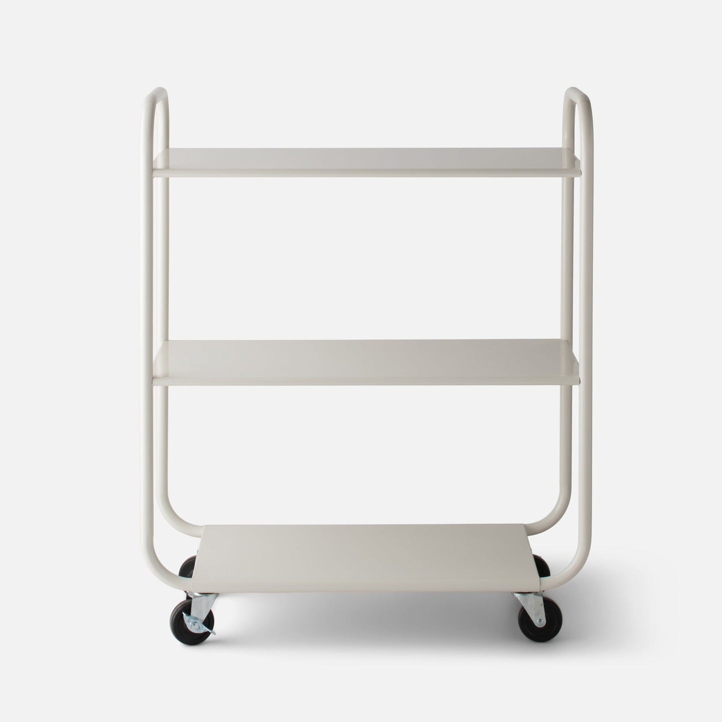 Front view of Miller Storage Cart showcasing three shelves and caster wheels in Shell White gloss on white background