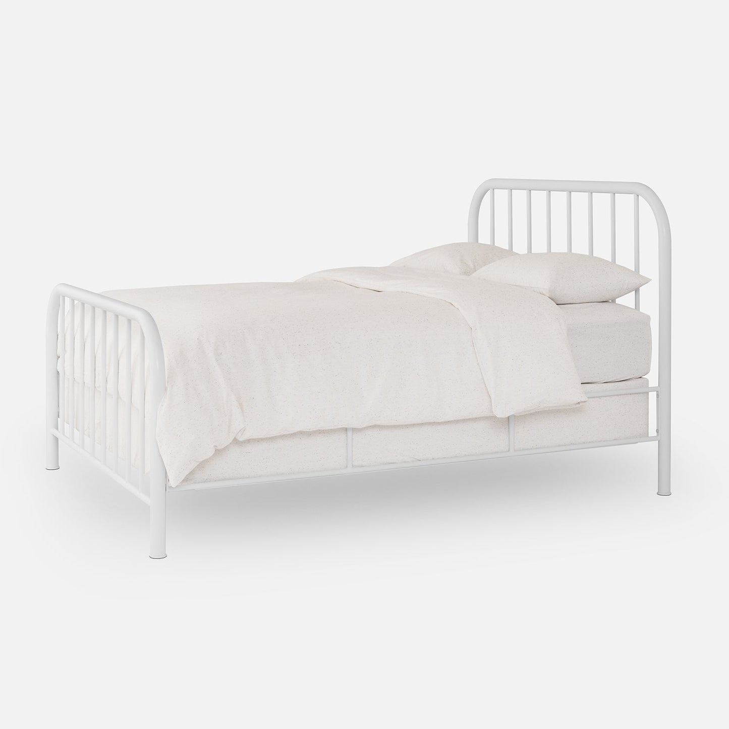 Angled view of Hamilton Bed showing white steel frame with rounded headboard and vertical slats on a white background