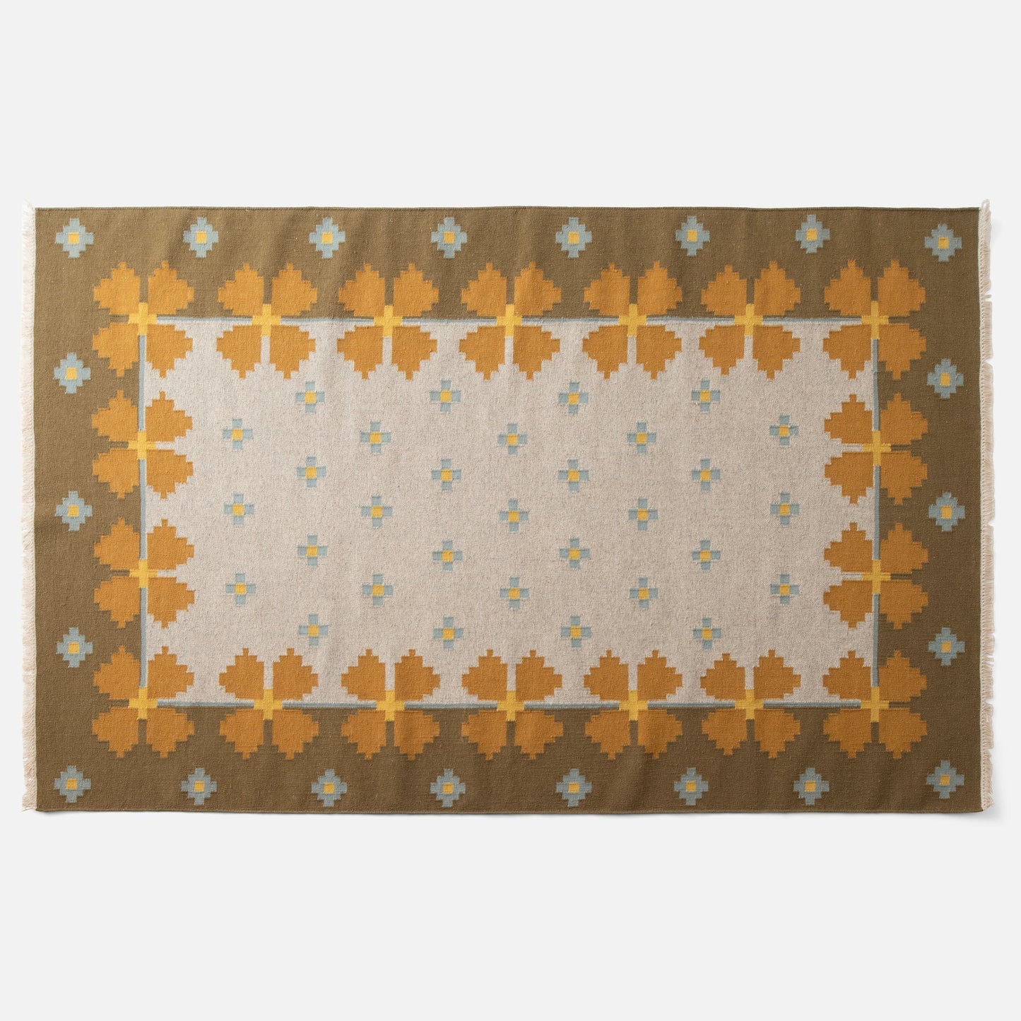 Top-down view of Flora Wool Flatweave Rug showing mustard floral border and small blue-and-yellow motifs on ivory field
