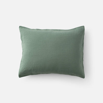 Top-down view of Linen Pillow Sham showcasing natural linen texture in laurel green on a white background