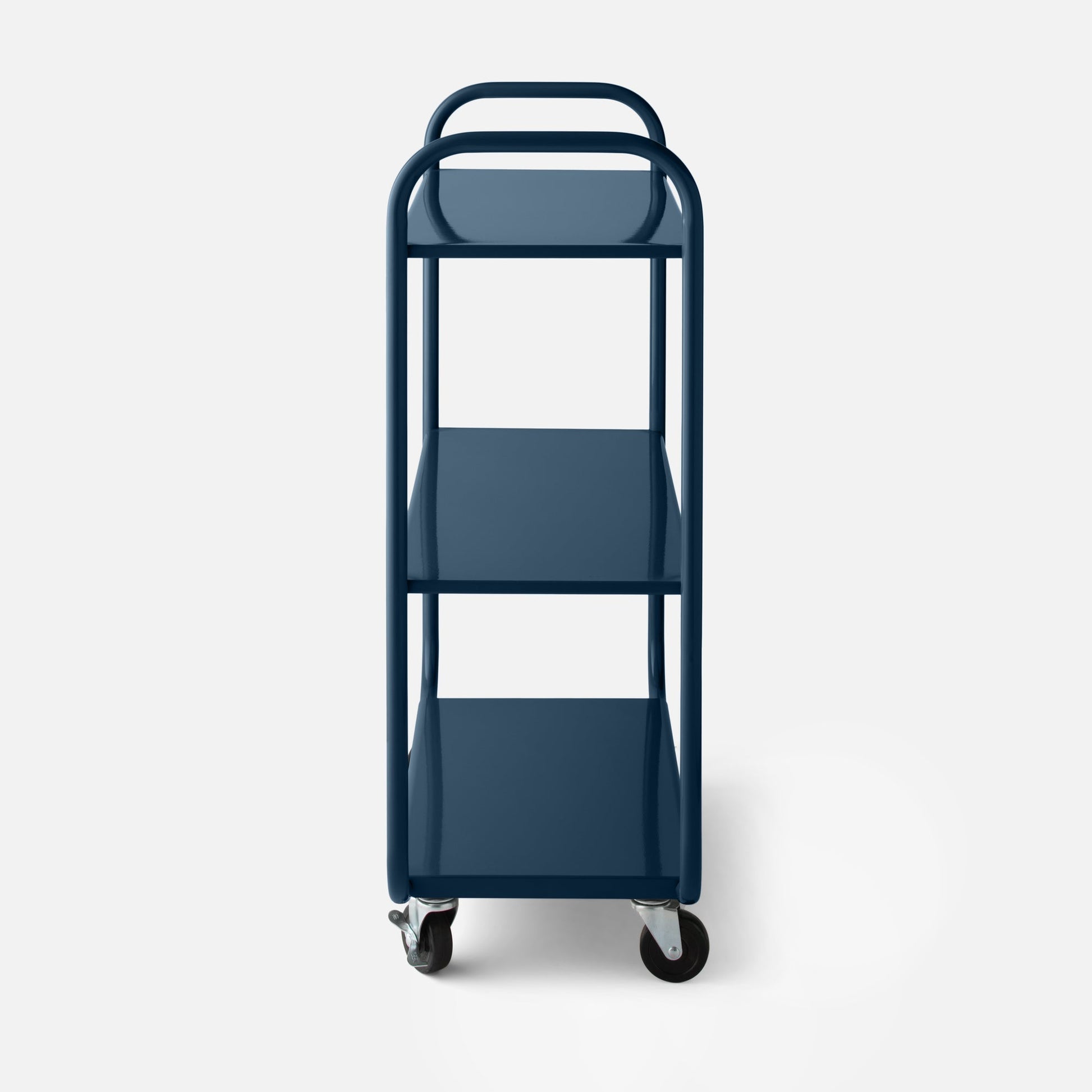Front close-up of Miller storage cart showcasing glossy navy blue tubular frame, three metal shelves and swivel casters on a white background