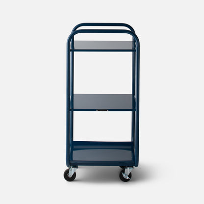 Front view of Miller storage cart showing three metal shelves, rounded tubular frame, and swivel casters on white background