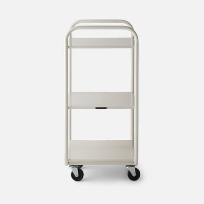 Front view of Miller Storage Cart showing three white metal shelves, rounded tubular handles and caster wheels on a plain studio background
