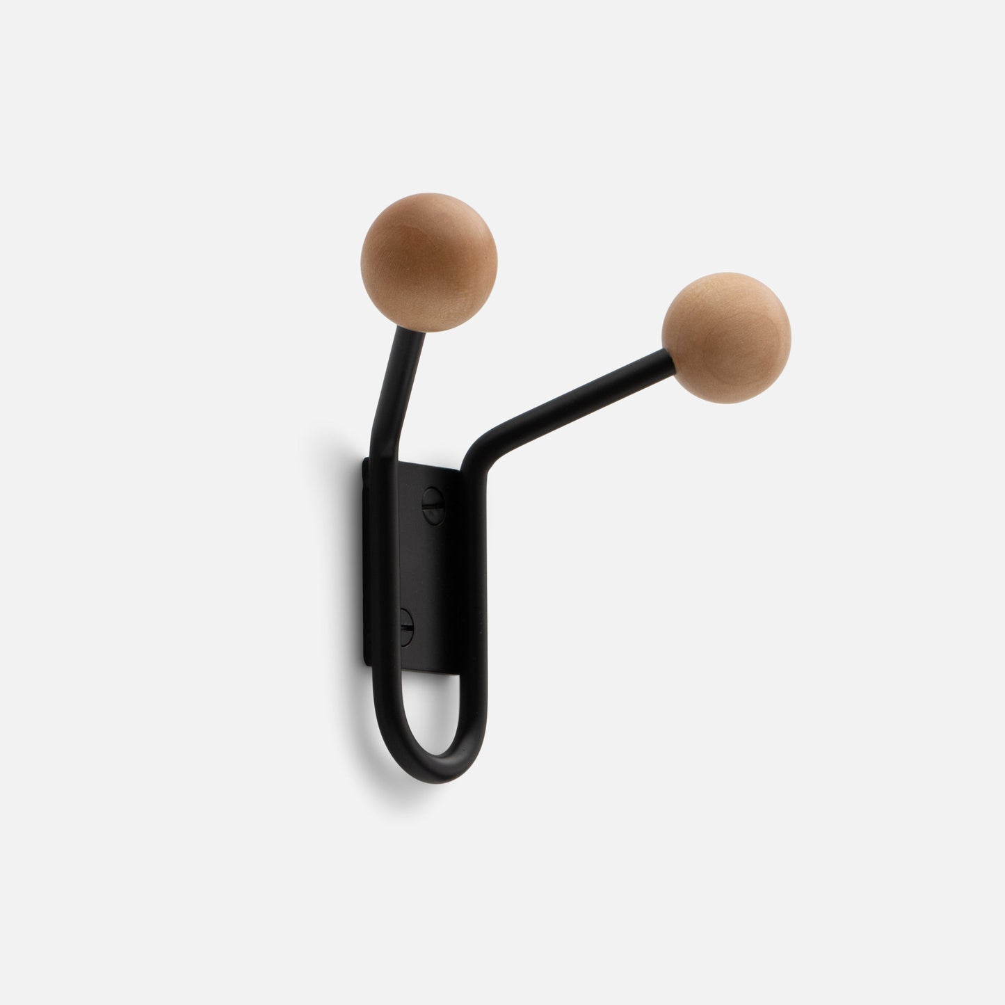 Close-up of Mollie Double Hook showcasing oak ball tips on black painted steel arms against a white background