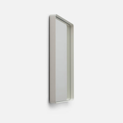 Angled close-up of Leo Mirror (20 by 30 inch) showing rounded white steel frame and 2 inch depth on white background