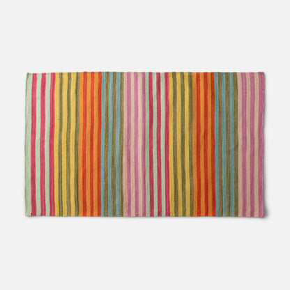 Top-down view of Lisse Performance Rug showcasing bold multicolor vertical stripes and flatweave texture on a white background