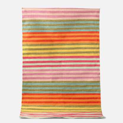 Full-length flat-lay of Lisse Performance Rug showcasing bold multicolor horizontal stripes on a white background