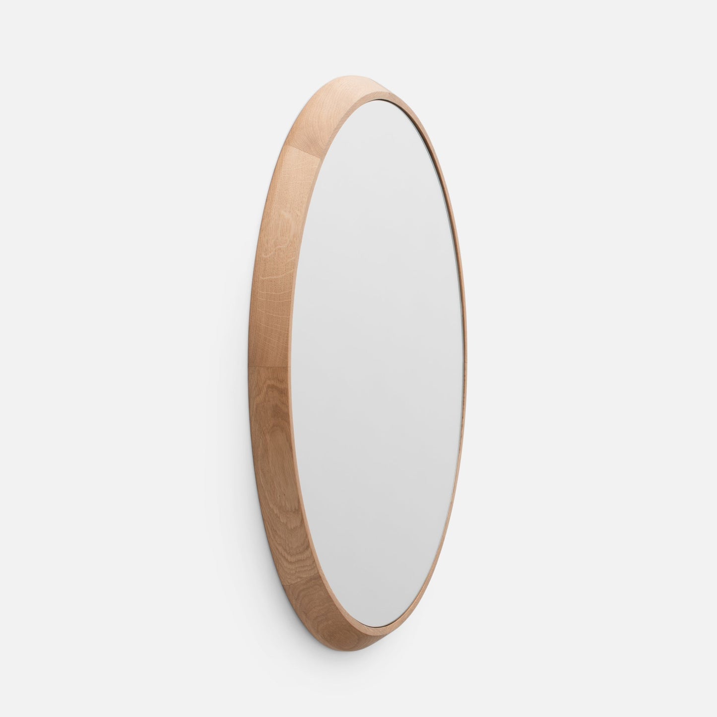 Angled close-up of Oak Chamfered Mirror showing chamfered edge and solid white oak frame against a white background