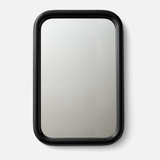 Front view of Forma Mirror showcasing rounded corners and glossy black frame on light gray background