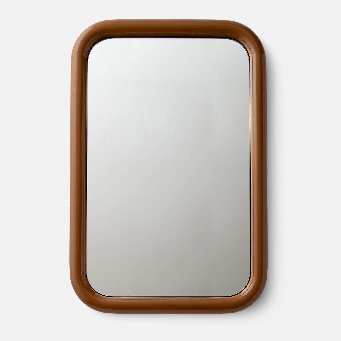 Close-up top view of Forma mirror showcasing rounded glossy brown frame on a white background