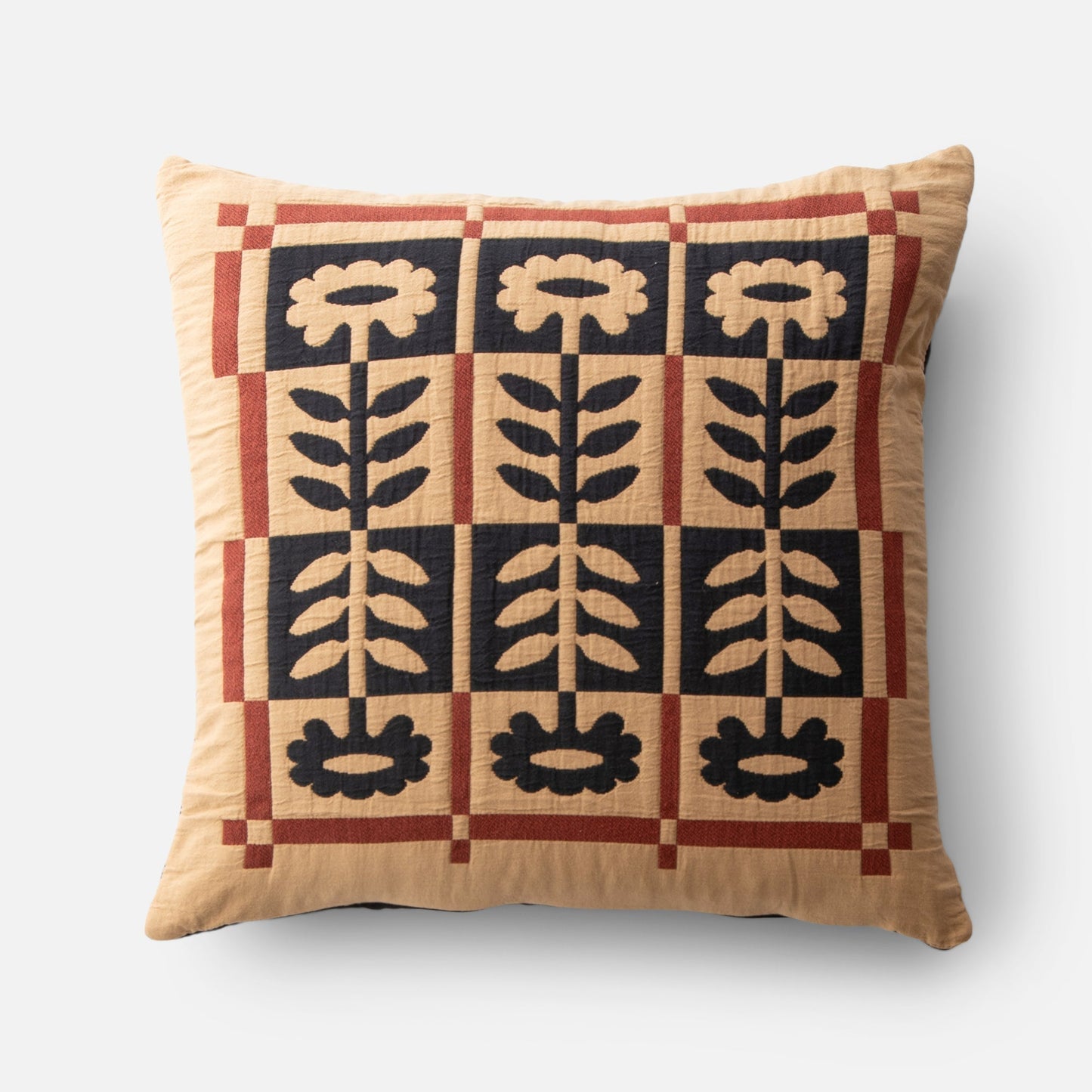 Front view of Stillwater Floral Sham showcasing mirrored black floral motif and red grid border on tan cotton background