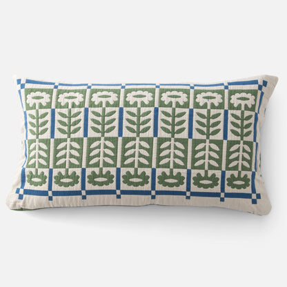 Front view of Stillwater Floral Sham showcasing green floral appliqué in a blue grid on cream cotton background
