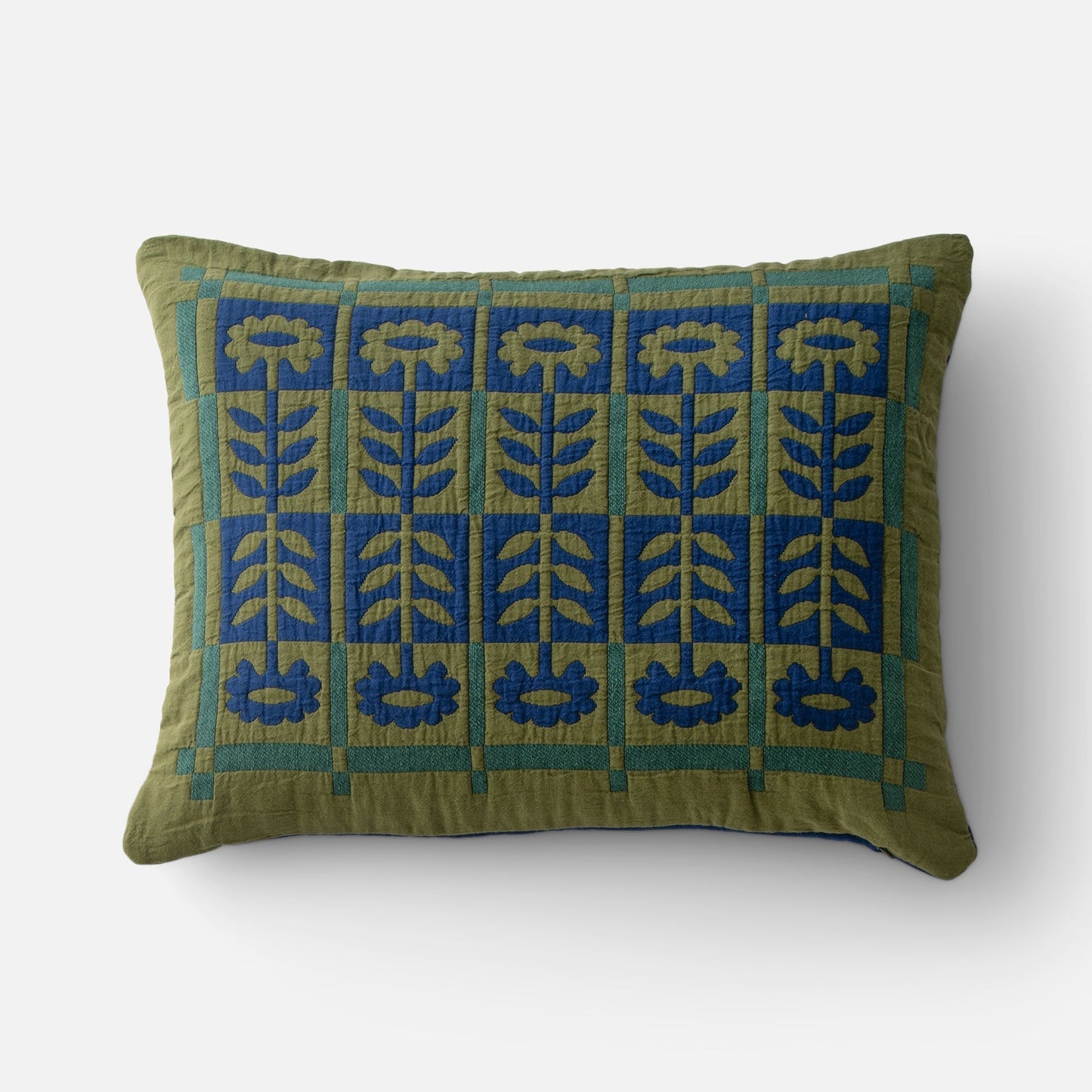 Front view of Stillwater Floral Sham showing green and blue mirrored floral applique on quilted cotton on white background