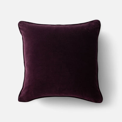 Top-front view of Pieced Velvet Pillow Cover showing rich plum 100% cotton velvet texture and piped edge on white background