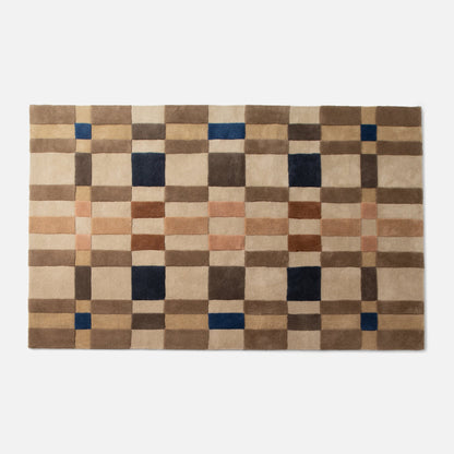 Top-down view of Campus Wool Rug runner showcasing recessed pile plaid pattern in brown with navy and terracotta squares on white background