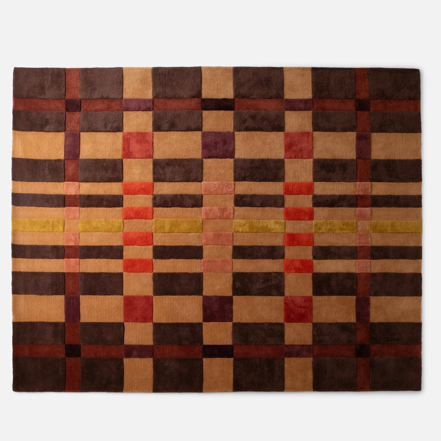 Top down view of Campus Wool Rug showing recessed wool pile and plaid inspired gradient in brown, tan and rust on white
