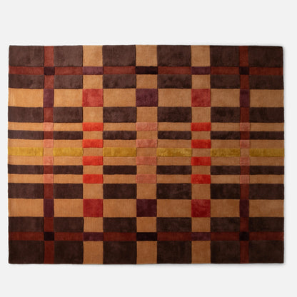 Top down view of Campus Wool Rug showing recessed wool pile and plaid inspired gradient in brown, tan and rust on white