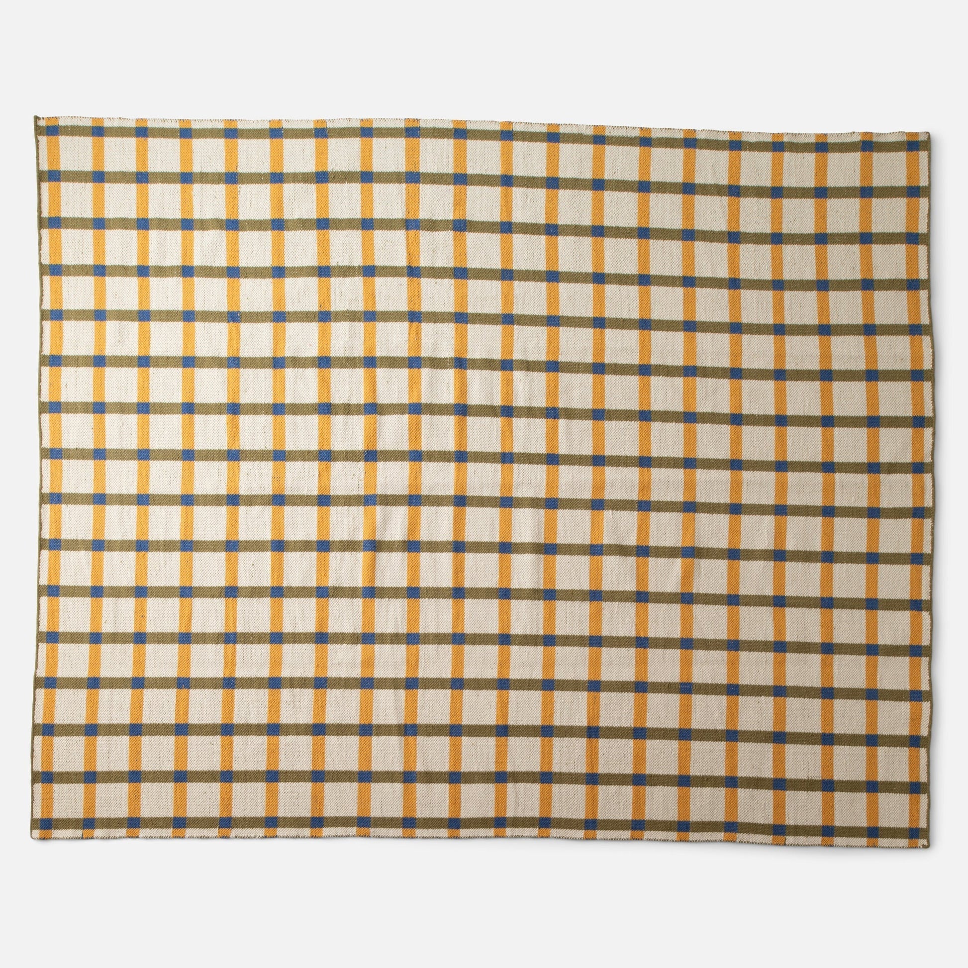 Overhead view of Plaid Wool Reversible Rug showcasing high-contrast yellow, olive, and blue plaid, handwoven from natural-dyed wool on a white studio background