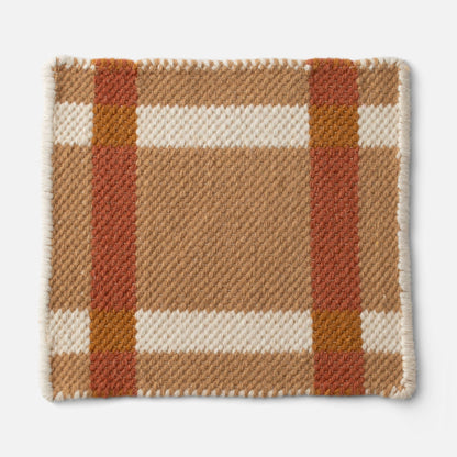 Close-up of Plaid Wool Reversible Rug showing handwoven wool texture, plaid pattern and serged edge on white background