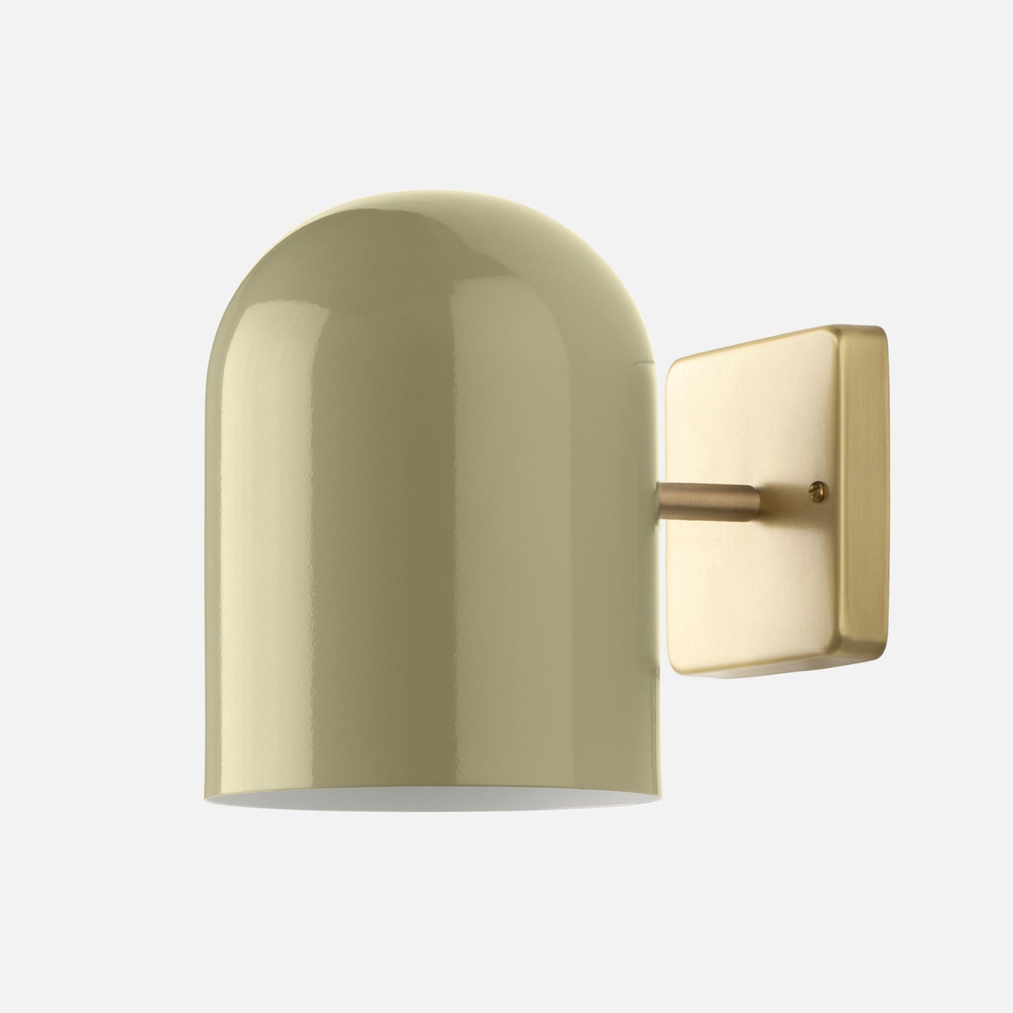 Close-up side view of Allegheny Wall Sconce showing glossy cylindrical shade and natural brass wall plate