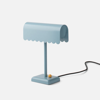 Front view of Dolores Table Lamp showcasing scalloped edge and contrasting dimmer knob against a white background