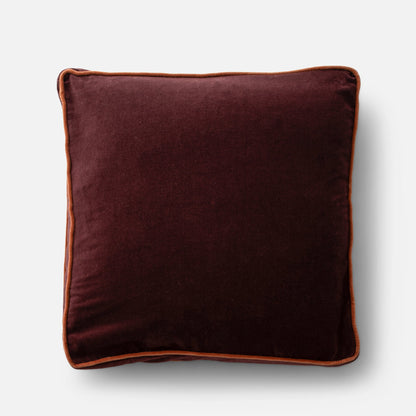 Overhead view of Velvet Piped Pillow showing raisin 100% cotton velvet and rust contrast piping on light gray background