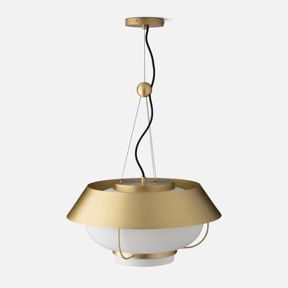 Front close up of Alfred Pendant showing natural brass canopy, twisted black cord, and white opal glass diffuser on light gray background