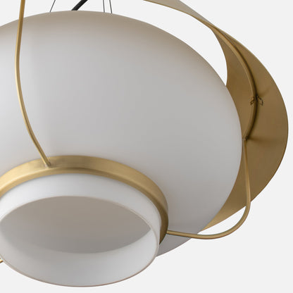 Close-up underside of Alfred Pendant showcasing natural brass frame and white opal glass diffuser against light gray background