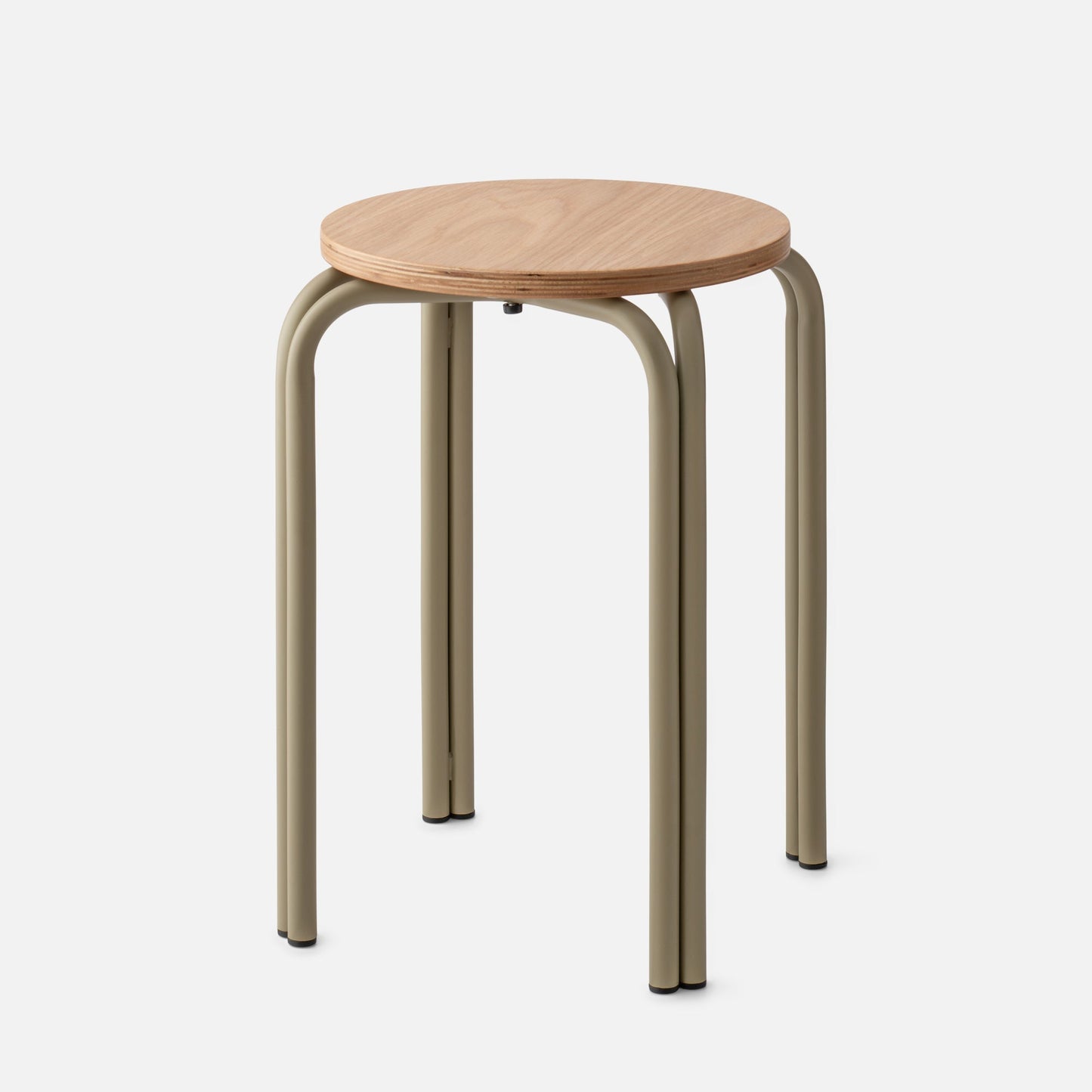 Front view of Forma Stool with round plywood seat, layered edge, and curved olive metal legs on light gray background