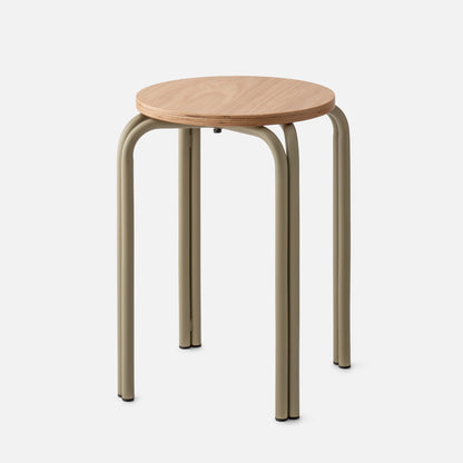 Front view of Forma Stool with round plywood seat, layered edge, and curved olive metal legs on light gray background