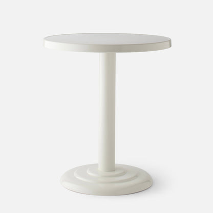 Front close-up of Owen Bistro Table showing round top and pedestal base in shell white gloss on light gray background