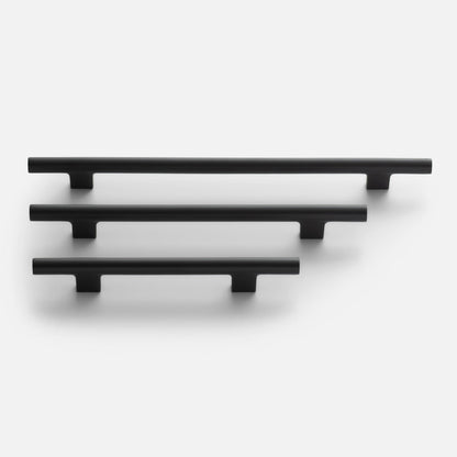 Front view of three True Black Galley Pulls showcasing tubular T-shaped design and matte finish on a white background