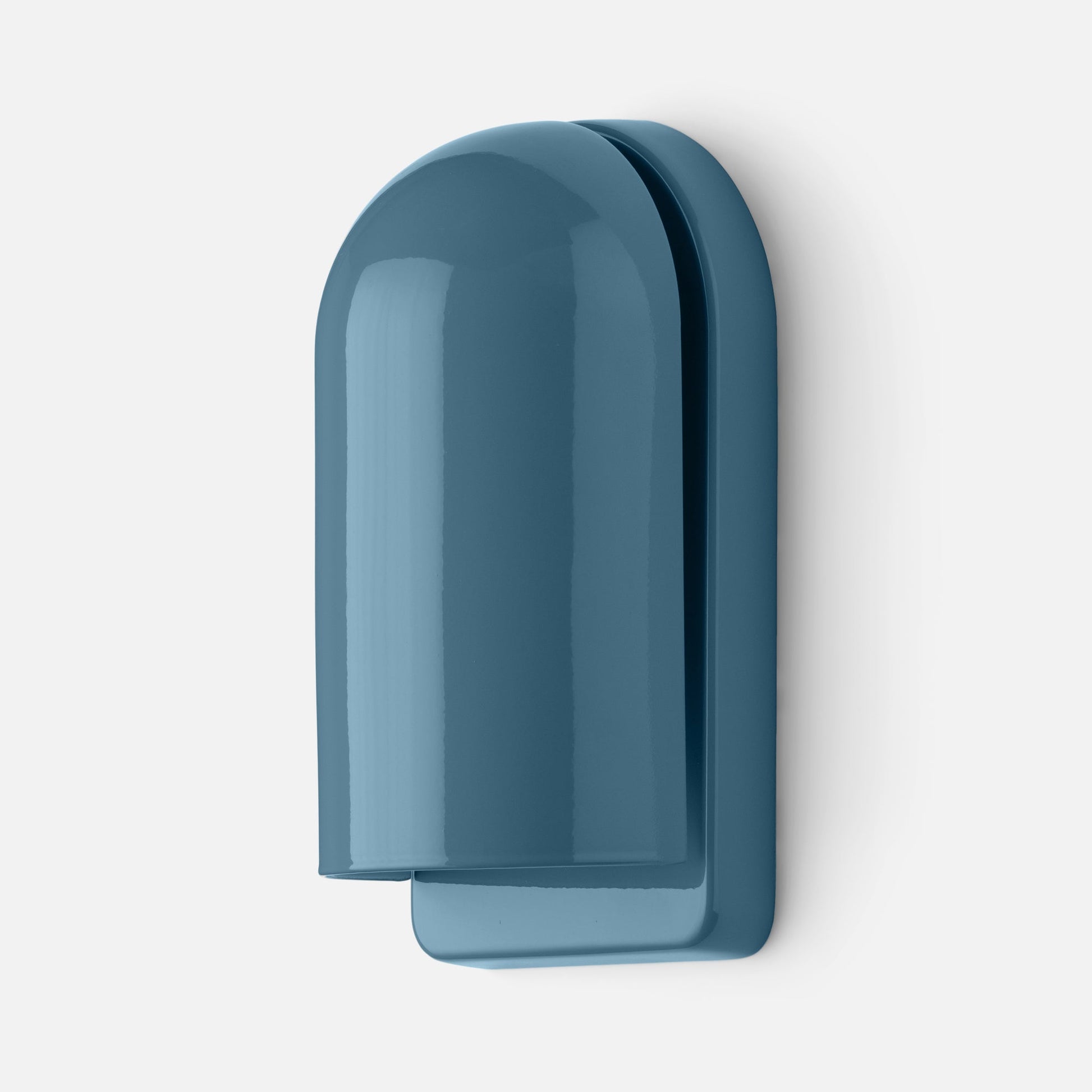 Close-up of Allegheny Slim Sconce showcasing gloss blue rounded dome shade and slim backplate against a white wall