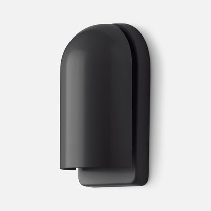 Close-up of Allegheny Slim Sconce showing matte black rounded shade and slim wall-mounted backplate on white background