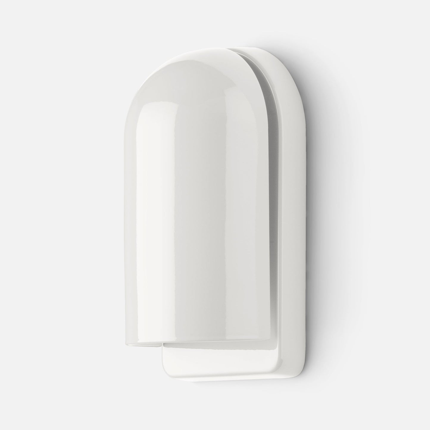 Close-up of Allegheny Slim Sconce in gloss white showing rounded dome shade and layered backplate against a white wall