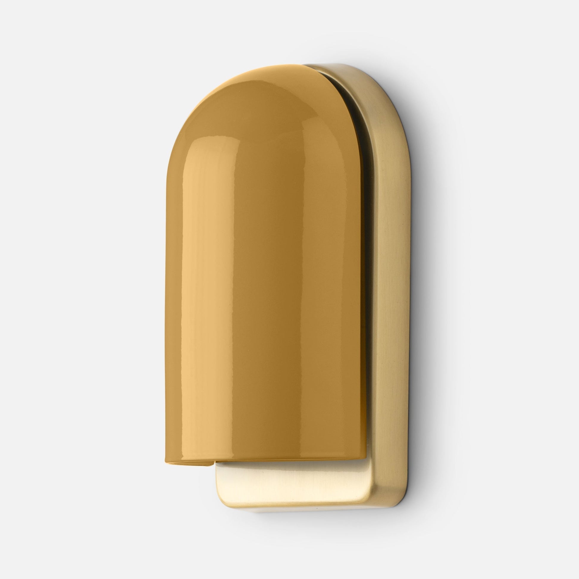 Close-up of Allegheny Slim Sconce showcasing glossy mustard-yellow dome shade and brushed brass backplate on white background