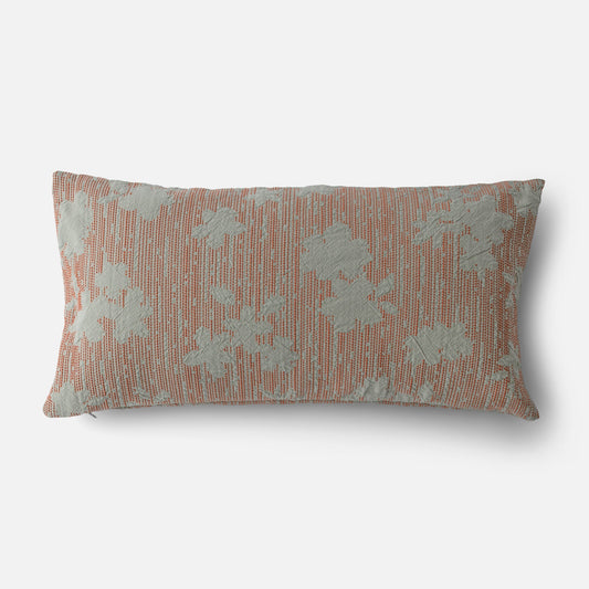 Front view of Shadow Floral Jacquard pillow showcasing coral woven background with pale blue floral jacquard, 12 by 24 inches, on white background